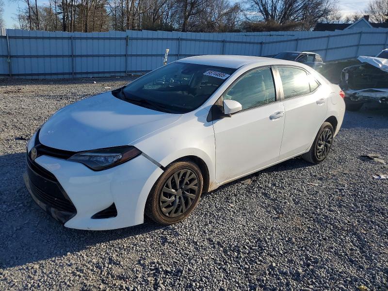 TOYOTA COROLLA 2017 with VIN 2T1BURHE7HC859623 - Photo from auction