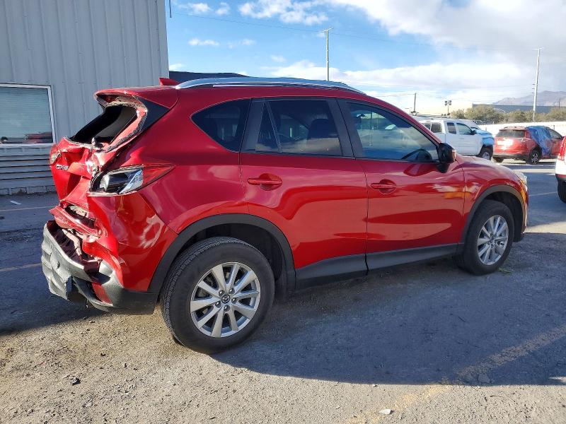 Photo 3 from auction – 2016 MAZDA CX-5 TOURI with VIN JM3KE2CYXG0698688