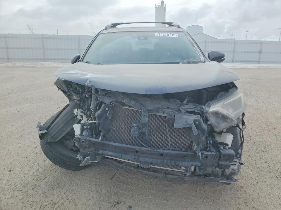 Photo 5 from auction – 2018 TOYOTA RAV4 with VIN JTMWFREV2JD122791
