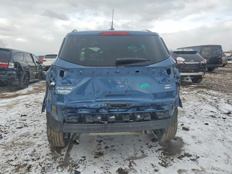 Photo 6 from auction – 2018 FORD ESCAPE SEL with VIN 1FMCU9HD4JUC79469