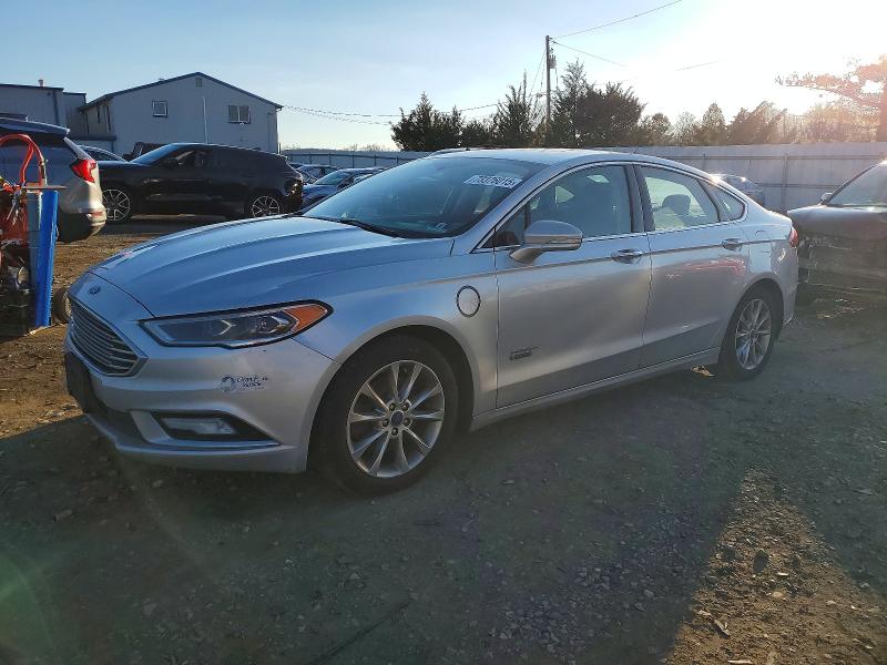 FORD FUSION TIT 2017 with VIN 3FA6P0SU4HR390575 - Photo from auction