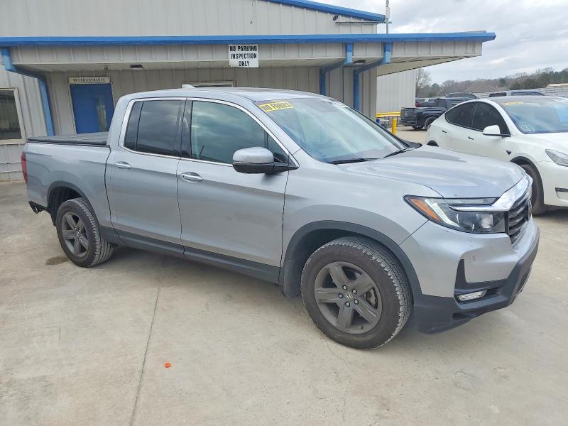 Photo 4 from auction – 2023 HONDA RIDGELINE with VIN 5FPYK3F73PB009104