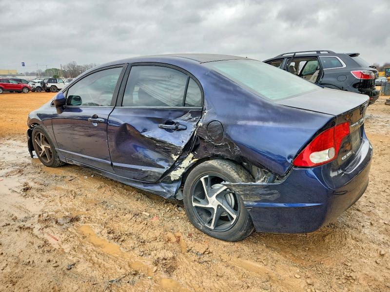 Photo 2 from auction – 2010 HONDA CIVIC with VIN 19XFA1F50AE010908