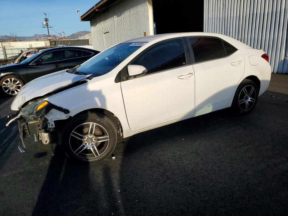 TOYOTA COROLLA L 2017 with VIN 5YFBURHEXHP709571 - Photo from auction