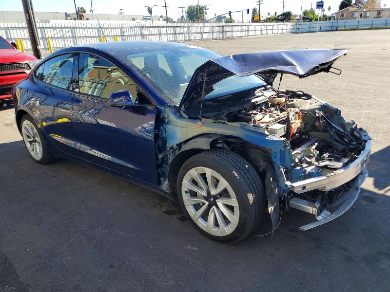 Photo 4 from auction – 2022 TESLA MODEL 3 with VIN 5YJ3E1EB2NF317463