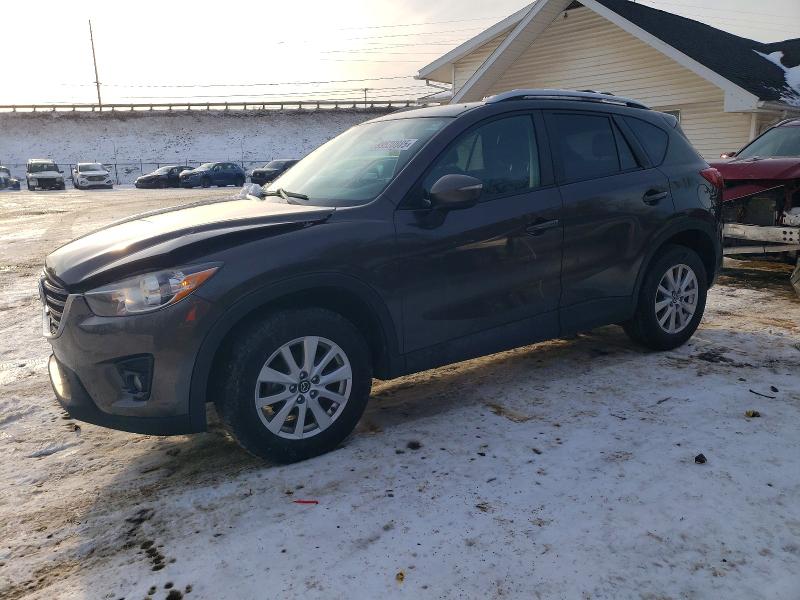 MAZDA CX-5 TOURI 2016 with VIN JM3KE4CY6G0748577 - Photo from auction