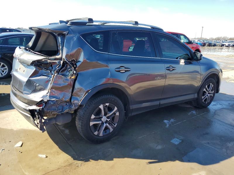Photo 3 from auction – 2017 TOYOTA RAV4 LE with VIN JTMZFREV4HJ144817