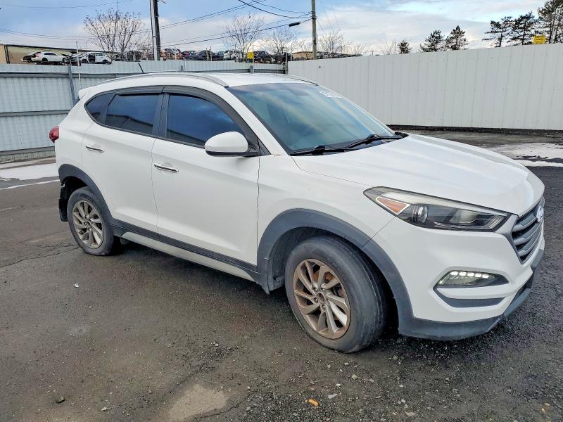 Photo 4 from auction – 2017 HYUNDAI TUCSON LIM with VIN KM8J3CA47HU513681