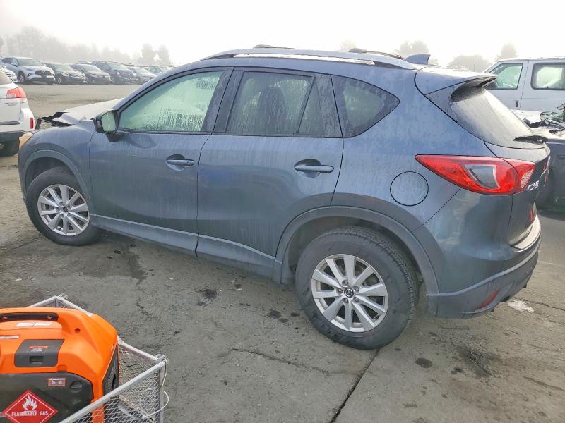 Photo 2 from auction – 2013 MAZDA CX-5 with VIN JM3KE2CE2D0128802