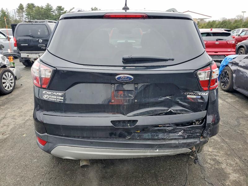 Photo 6 from auction – 2018 FORD ESCAPE TIT with VIN 1FMCU9J91JUD39973