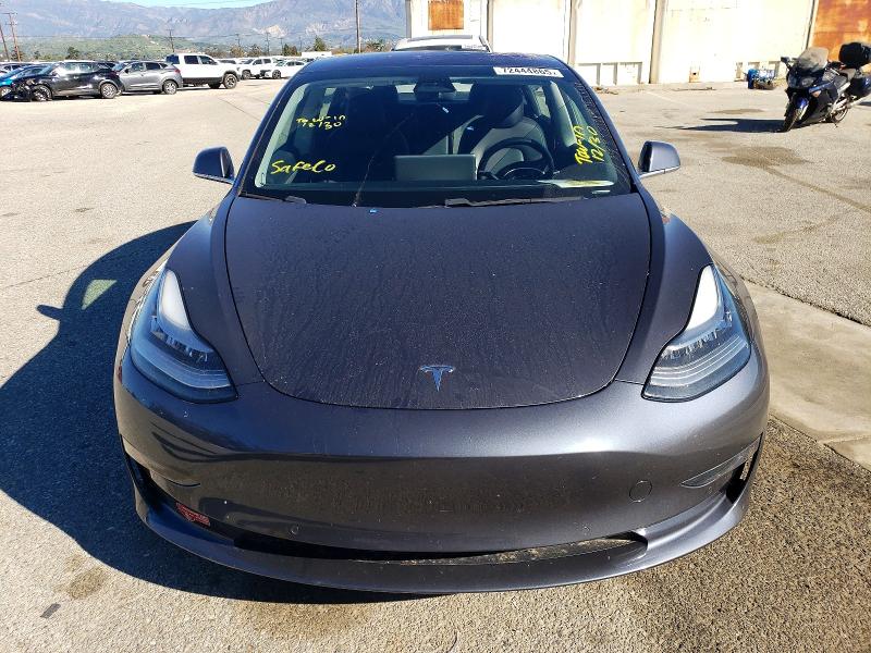 Photo 5 from auction – 2018 TESLA MODEL 3 with VIN 5YJ3E1EA5JF036677