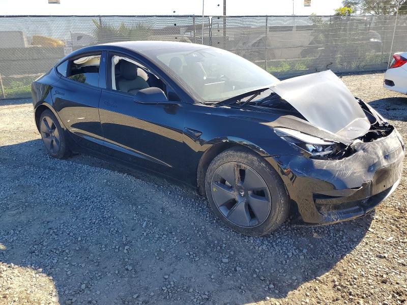 Photo 4 from auction – 2021 TESLA MODEL 3 with VIN 5YJ3E1EA8MF876490