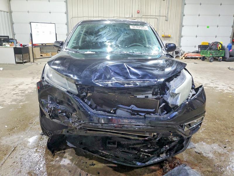 Photo 5 from auction – 2015 HONDA CR-V EX with VIN 2HKRM4H52FH643948