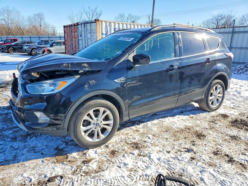 FORD ESCAPE SE 2018 with VIN 1FMCU0GD2JUC29084 - Photo from auction