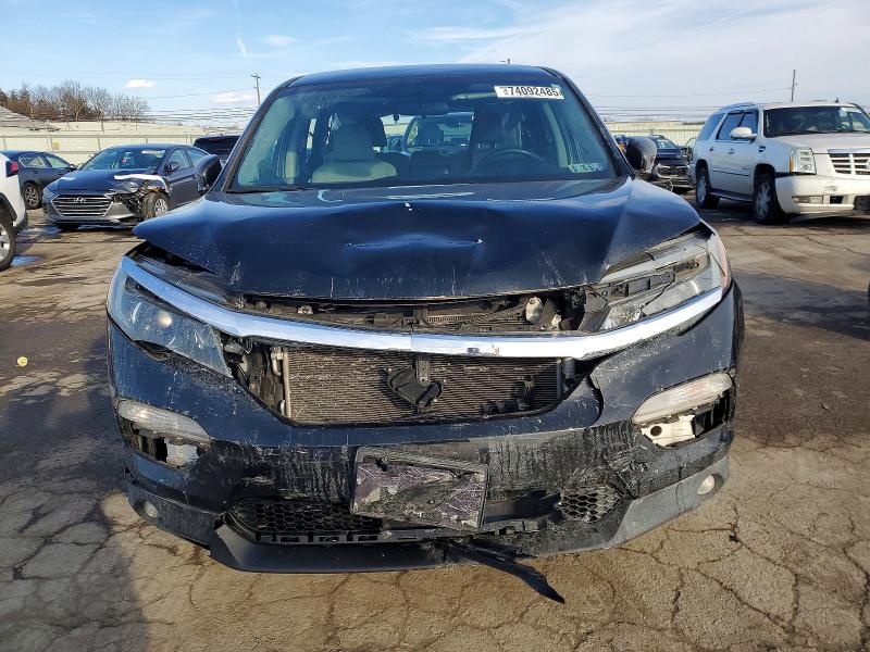 Photo 5 from auction – 2016 HONDA PILOT EX with VIN 5FNYF6H3XGB090174