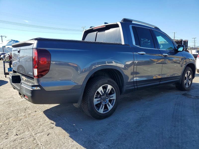 Photo 3 from auction – 2018 HONDA RIDGELINE with VIN 5FPYK3F74JB015548
