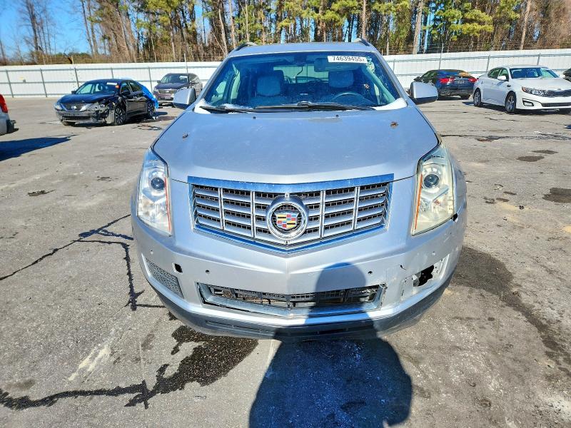 Photo 5 from auction – 2014 CADILLAC SRX with VIN 3GYFNAE39ES610140