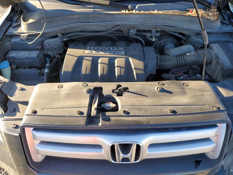 Photo 12 from auction – 2006 HONDA PILOT EX with VIN 5FNYF18466B007141