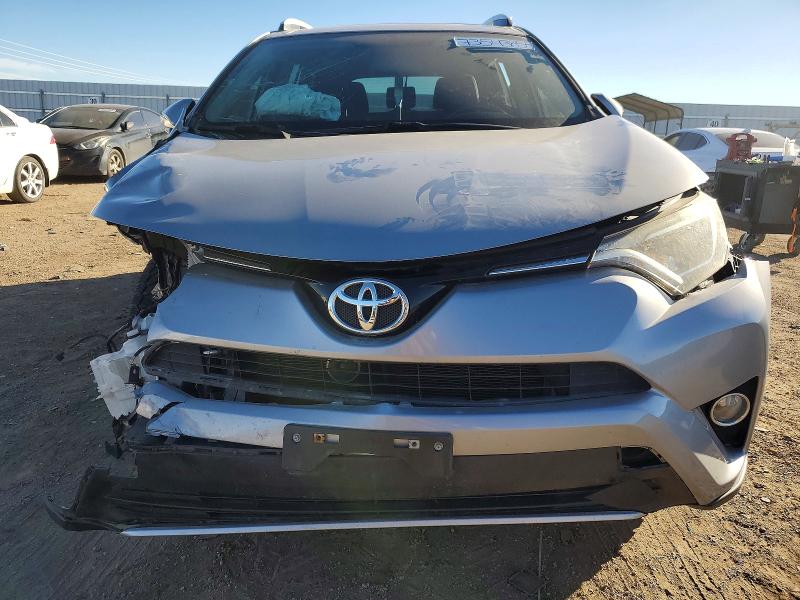 Photo 5 from auction – 2016 TOYOTA RAV4 with VIN 2T3RFREV2GW451970