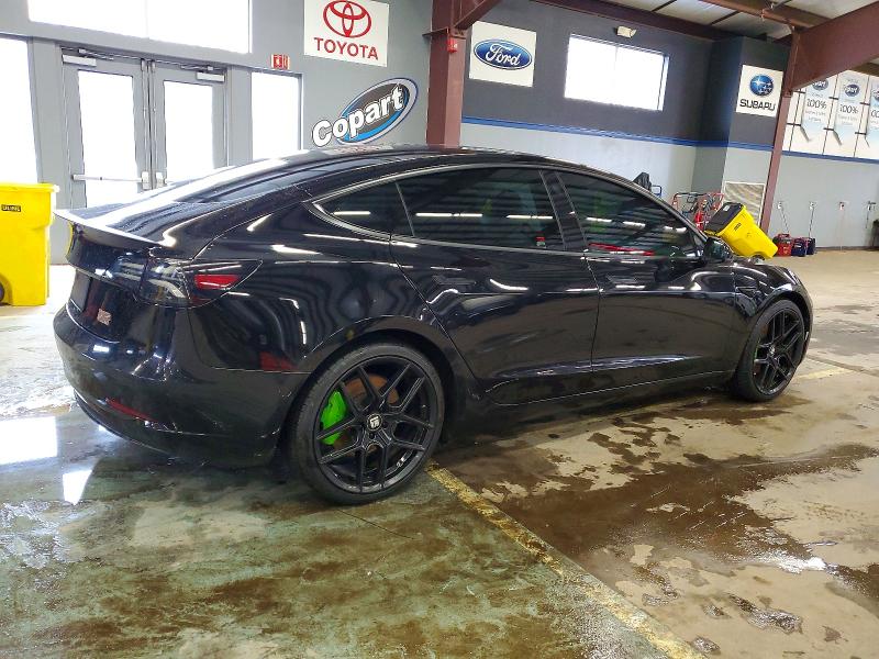 Photo 3 from auction – 2022 TESLA MODEL 3 with VIN 5YJ3E1EC1NF345537
