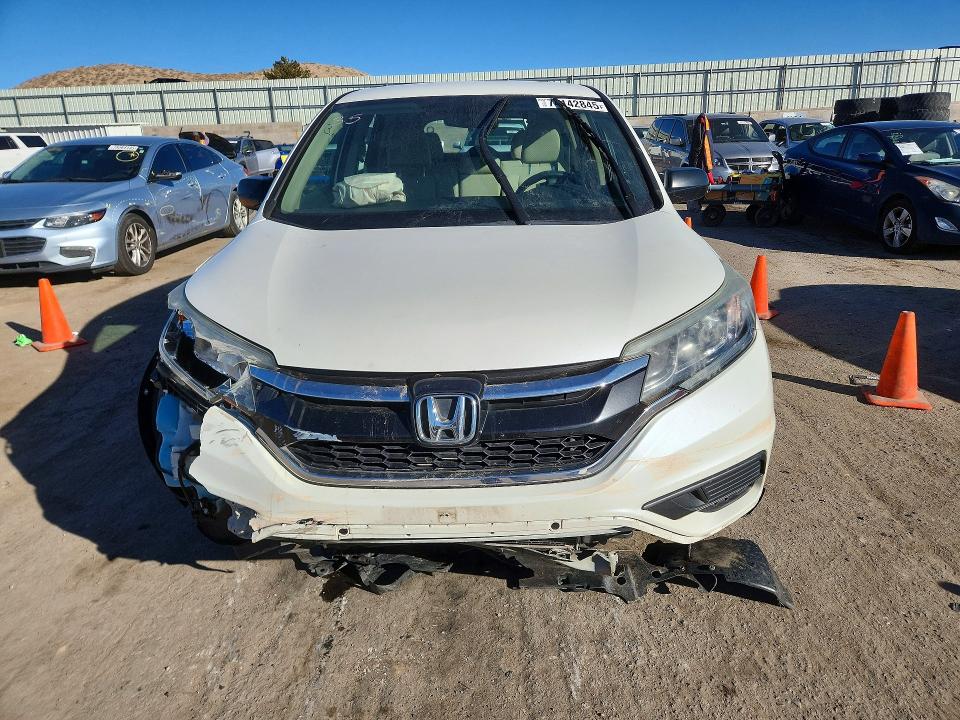 Photo 5 from auction – 2016 HONDA CR-V LX with VIN 5J6RM4H30GL069310