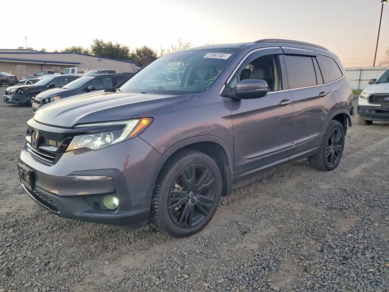 HONDA PILOT SE 2021 with VIN 5FNYF6H23MB033883 - Photo from auction