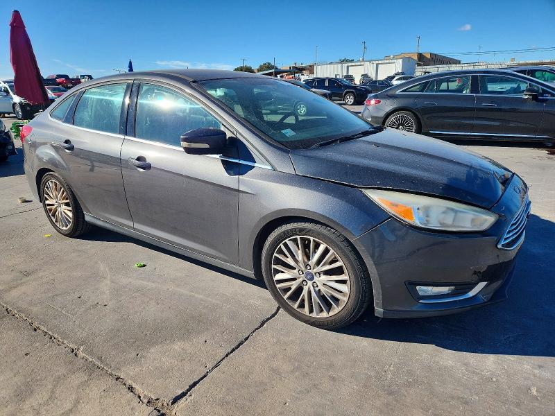Photo 4 from auction – 2015 FORD FOCUS TITA with VIN 1FADP3J24FL384599