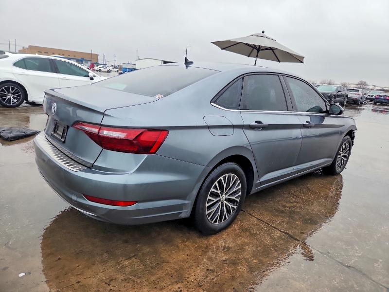 Photo 3 from auction – 2021 VOLKSWAGEN JETTA with VIN 3VWC57BU0MM102048