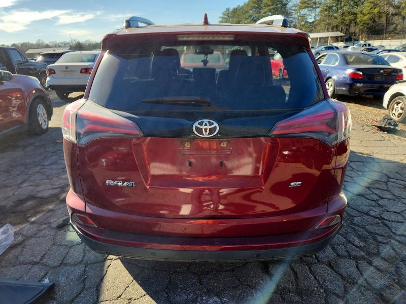 Photo 6 from auction – 2018 TOYOTA RAV4 SE with VIN JTMNFREV2JD117361