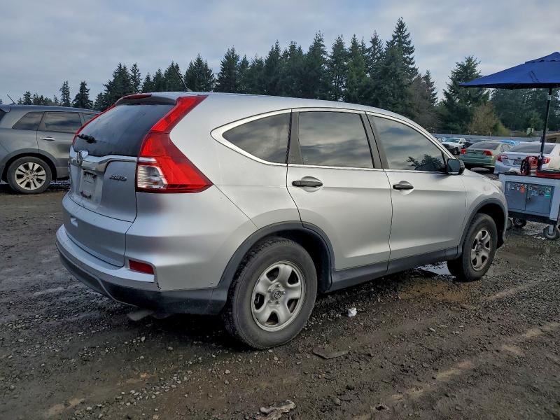 Photo 3 from auction – 2016 HONDA CR-V LX with VIN 2HKRM4H37GH633688