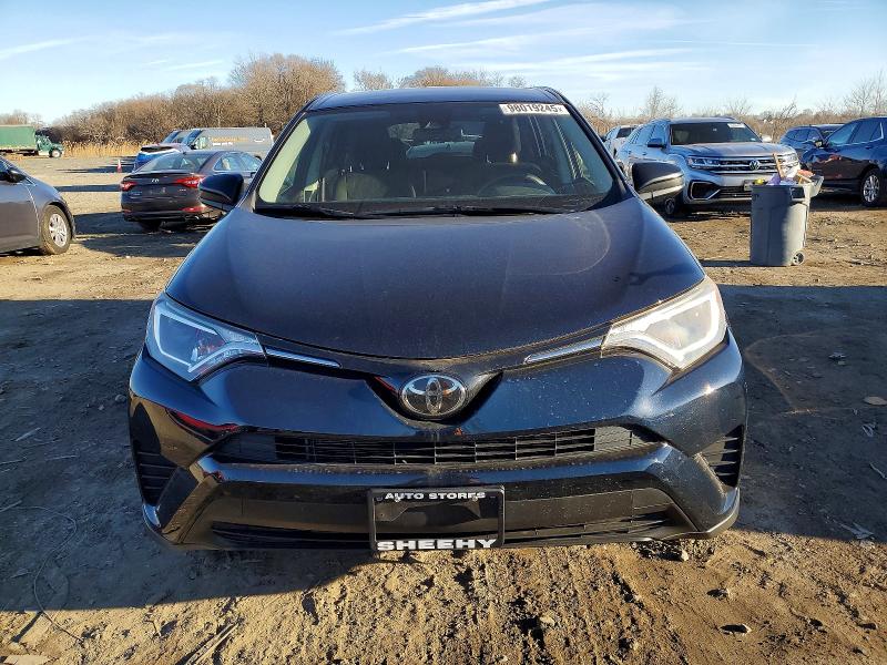 Photo 5 from auction – 2018 TOYOTA RAV4 LE with VIN JTMBFREV9JD256860
