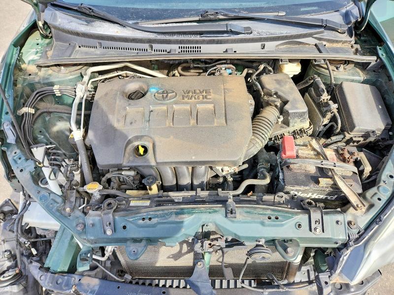 Photo 11 from auction – 2014 TOYOTA COROLLA EC with VIN 2T1BPRHE2EC142078