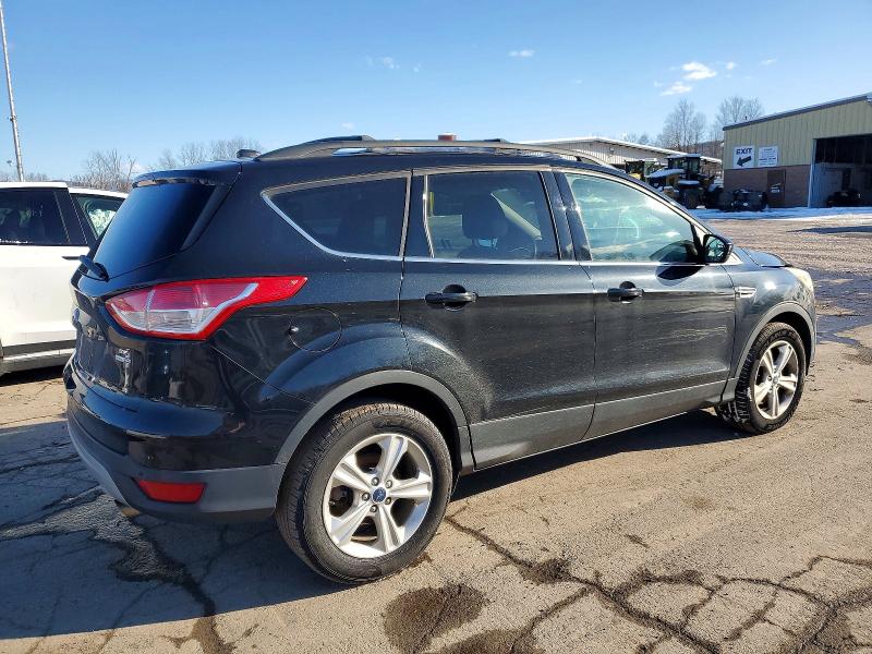 Photo 3 from auction – 2015 FORD ESCAPE SE with VIN 1FMCU9GX0FUA13787
