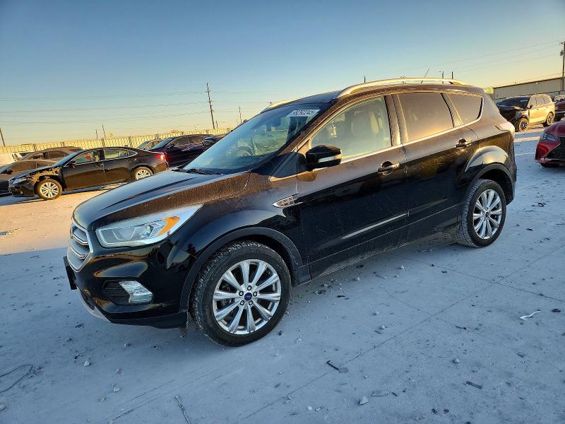 FORD ESCAPE TIT 2017 with VIN 1FMCU0J92HUB46625 - Photo from auction