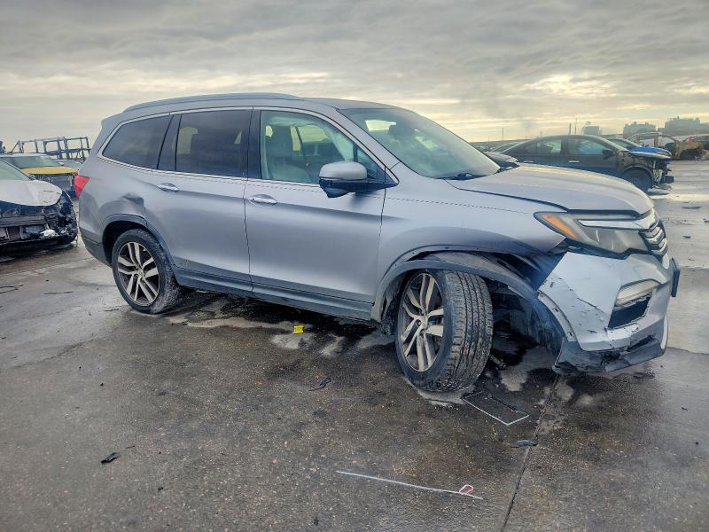 Photo 4 from auction – 2016 HONDA PILOT TOUR with VIN 5FNYF5H96GB052522