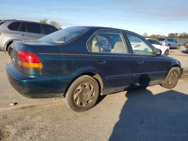 Снимка 3 от търг – 1997 HONDA CIVIC с VIN 2HGEJ8642VH503013