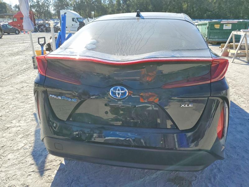 Photo 6 from auction – 2021 TOYOTA PRIUS PRIM with VIN JTDKAMFPXM3195692