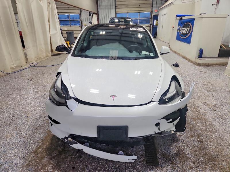 Photo 5 from auction – 2022 TESLA MODEL 3 with VIN 5YJ3E1EB9NF110603