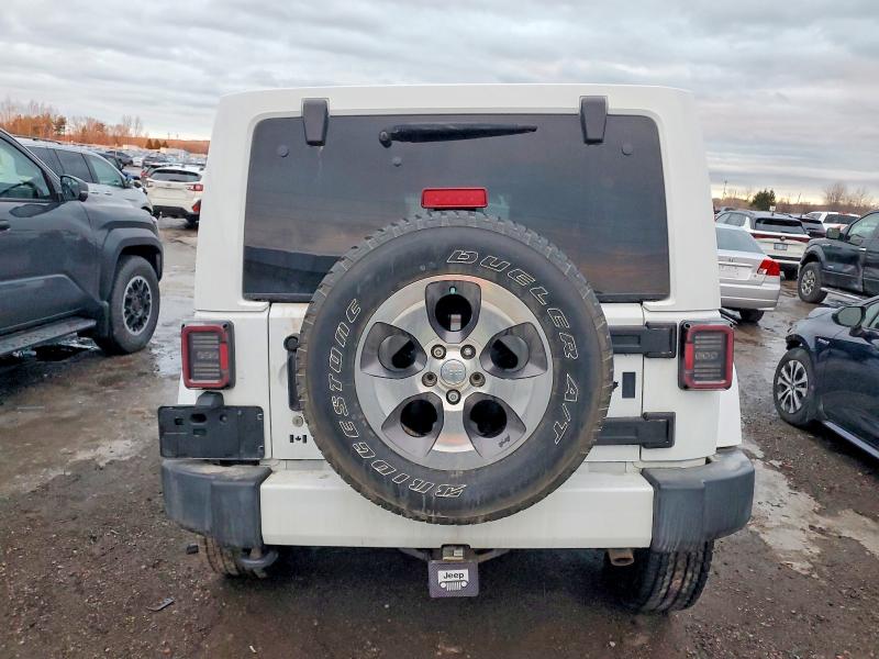 Photo 6 from auction – 2016 JEEP WRANGLER U with VIN 1C4BJWEG1GL296007