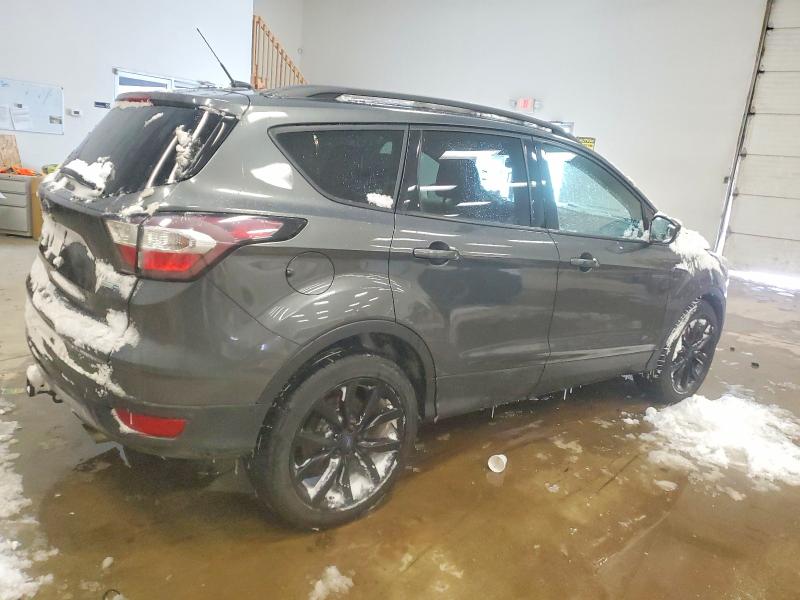 Photo 3 from auction – 2017 FORD ESCAPE with VIN 1FMCU9J96HUE77485