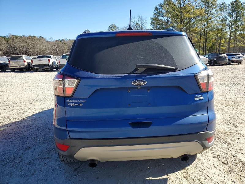 Photo 6 from auction – 2018 FORD ESCAPE with VIN 1FMCU0HD0JUA16116