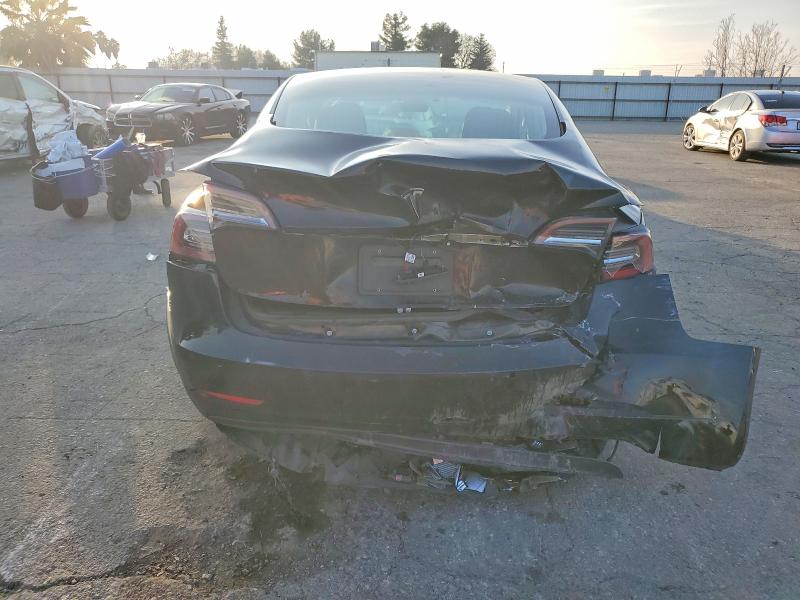 Photo 6 from auction – 2019 TESLA MODEL 3 with VIN 5YJ3E1EA7KF304758