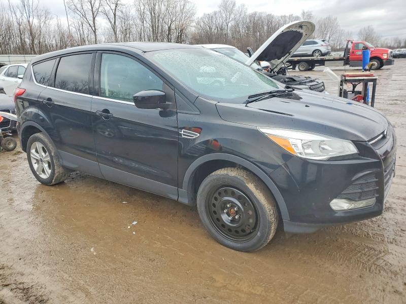 Photo 4 from auction – 2016 FORD ESCAPE with VIN 1FMCU9GX5GUC56464