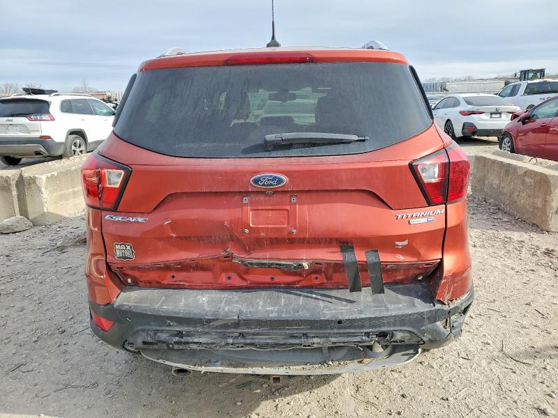 Photo 6 from auction – 2019 FORD ESCAPE TIT with VIN 1FMCU9J94KUA39832