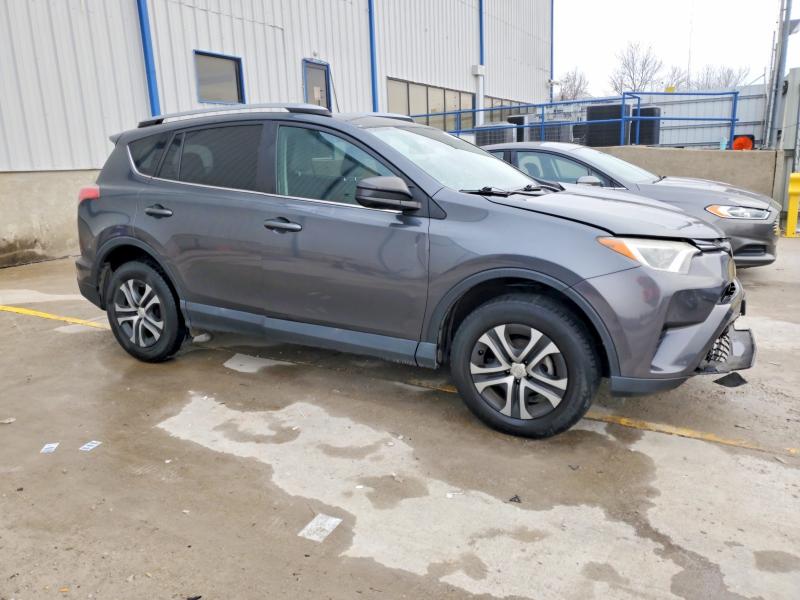 Photo 4 from auction – 2018 TOYOTA RAV4 LE with VIN 2T3BFREVXJW766413