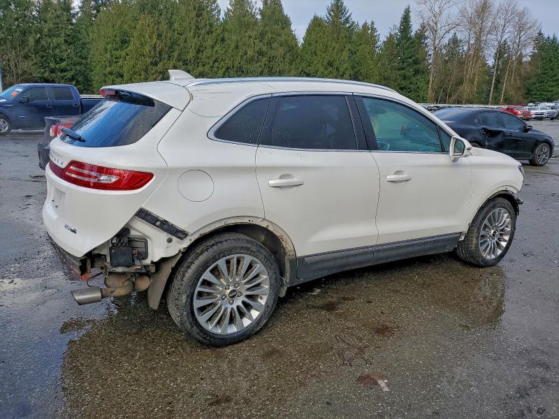 Photo 3 from auction – 2015 LINCOLN MKC with VIN 5LMCJ2A92FUJ26860