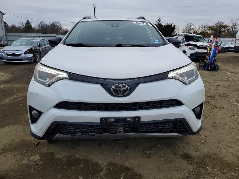 Photo 5 from auction – 2018 TOYOTA RAV4 SE with VIN JTMJFREV2JD241564