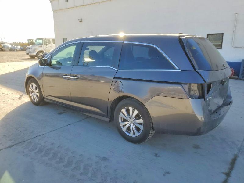 Photo 2 from auction – 2016 HONDA ODYSSEY with VIN 5FNRL5H61GB068940