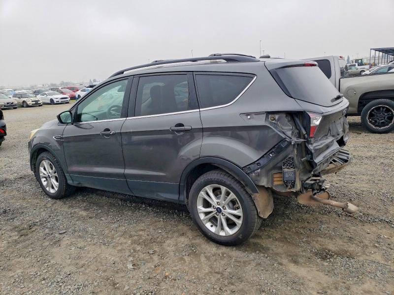 Photo 2 from auction – 2018 FORD ESCAPE SE with VIN 1FMCU9GD2JUA87341