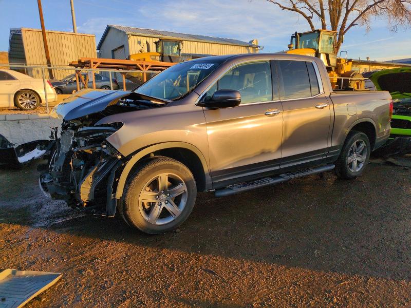 HONDA RIDGELINE 2022 with VIN 5FPYK3F71NB010541 - Photo from auction